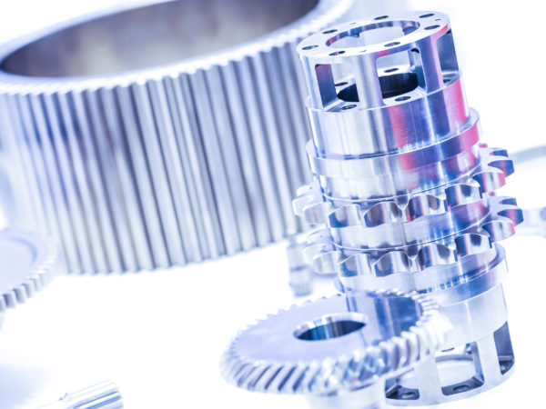 blue toned precision machine parts used in the aviation industry